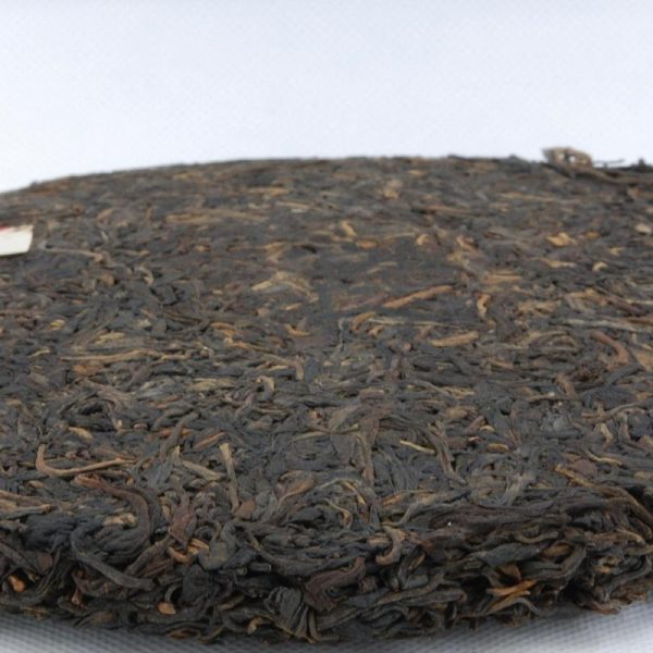 Pu erh Teas | The Chinese Tea Shop 1990's Jiang Cheng Spring Tips Pu-erh Tea Cake (Raw/Sheng) Pu erh Teas Pu erh Teas